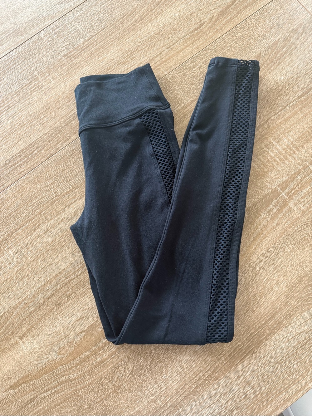Bombshell Sportswear Black Leggings with Side Mesh Panels